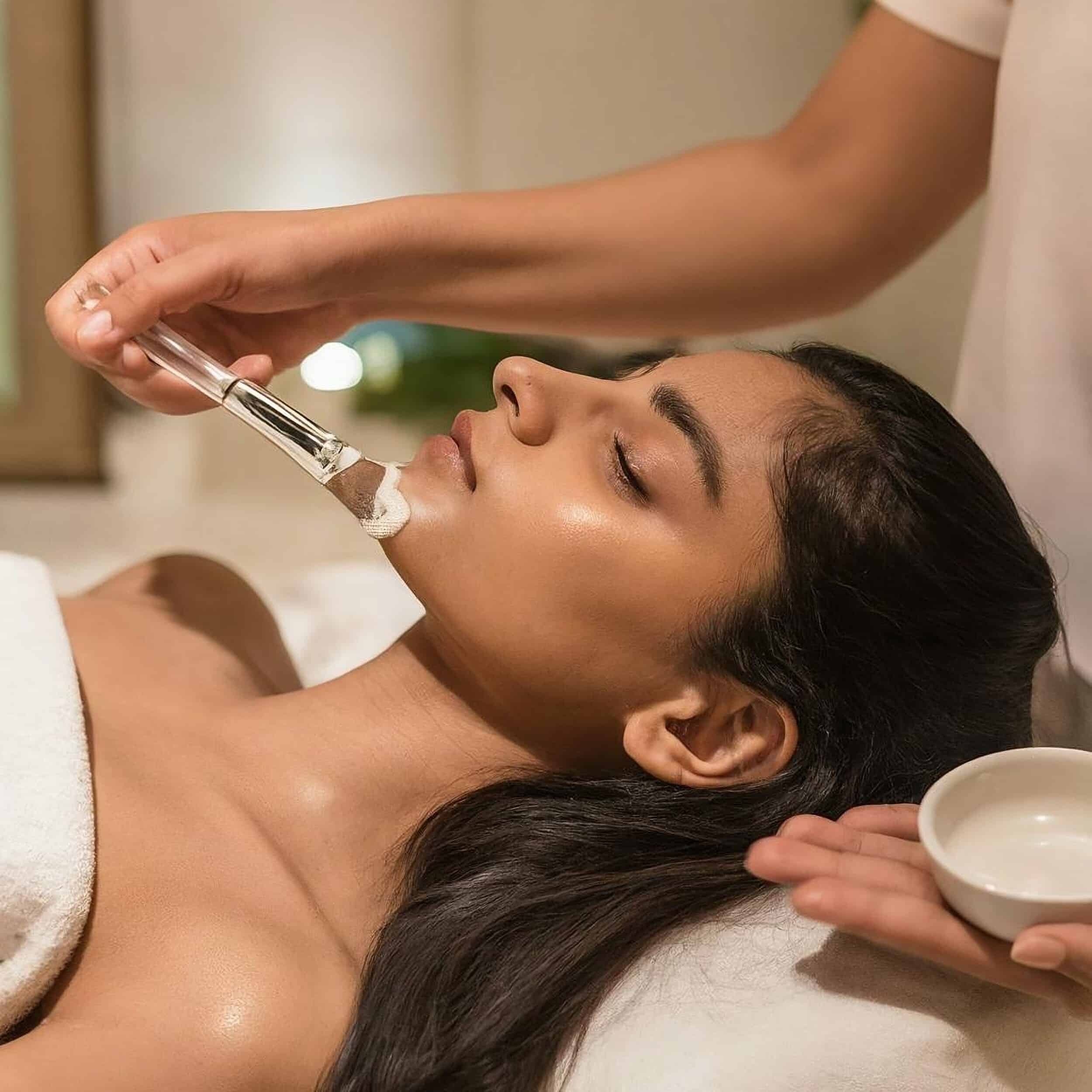 A,Young,Indian,Person,Receiving,A,Relaxing,Facial,Treatment,At